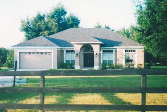 Front elevation of Mediterranean home (ThePlanCollection: House Plan #190-1013)