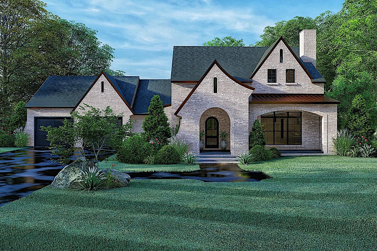 Front elevation of French home (ThePlanCollection: House Plan #193-1173)