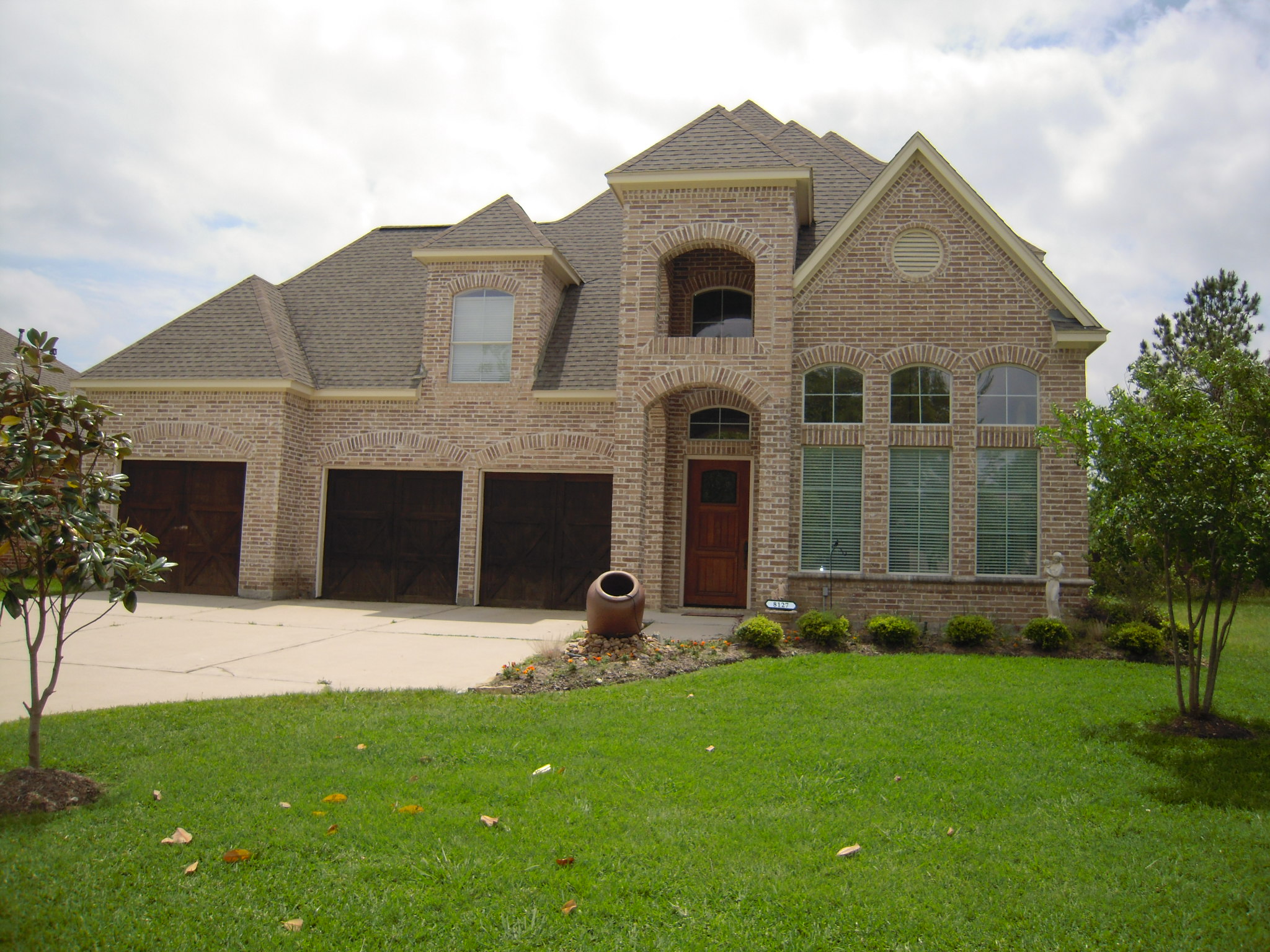 Color photograph of Luxury home plan (The Plan Collection House Plan #195-1007)