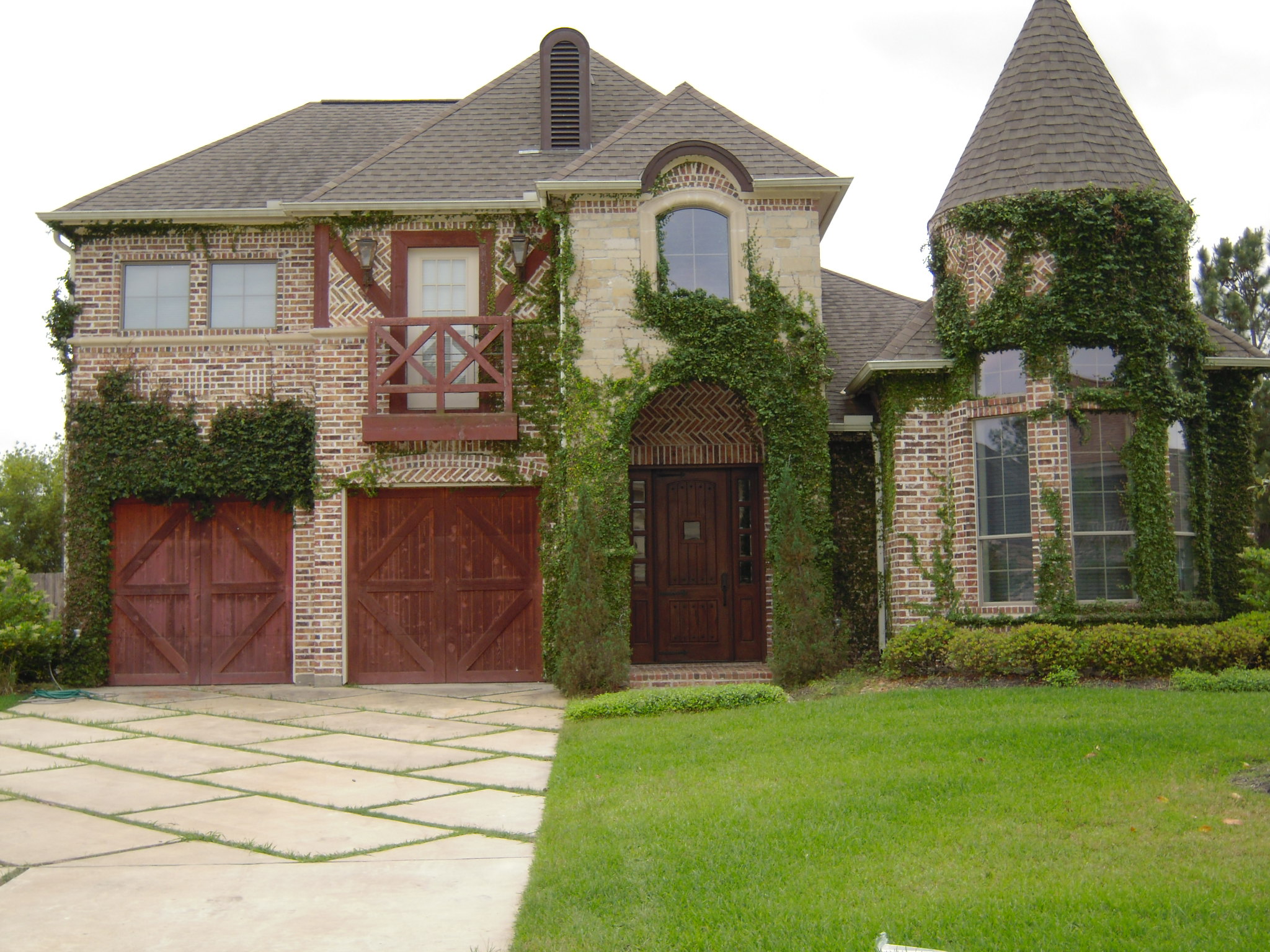 Color photo of European style home plan (TPC, House Plan #195-1008).