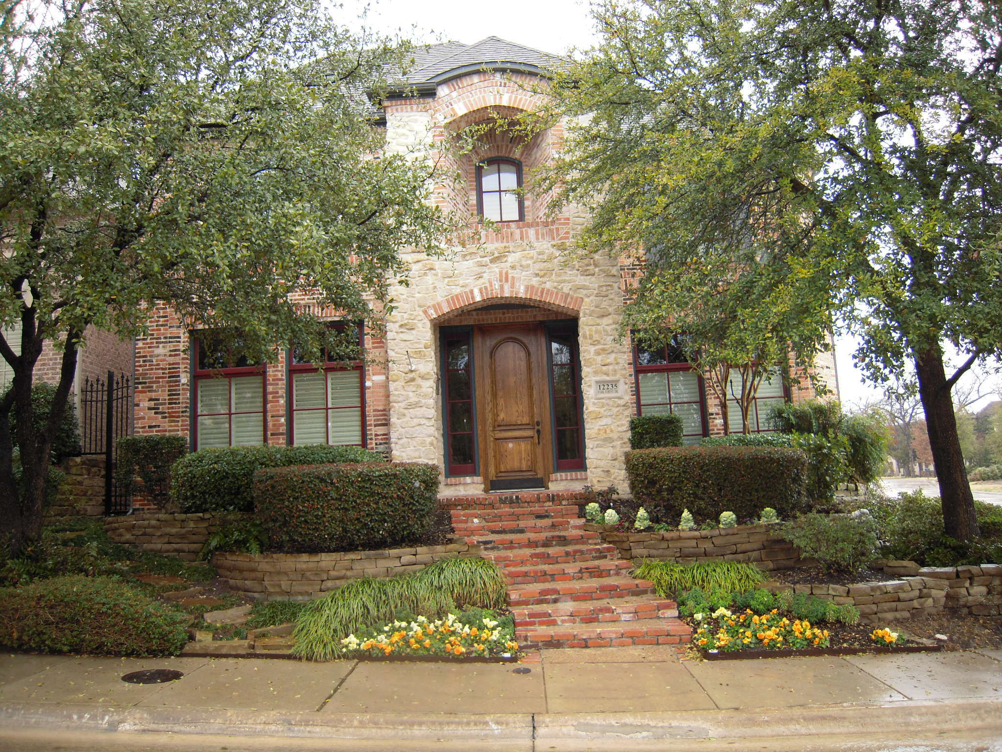 Color photo of Luxury home plan (House Plan #195-1010) at The Plan Collection.