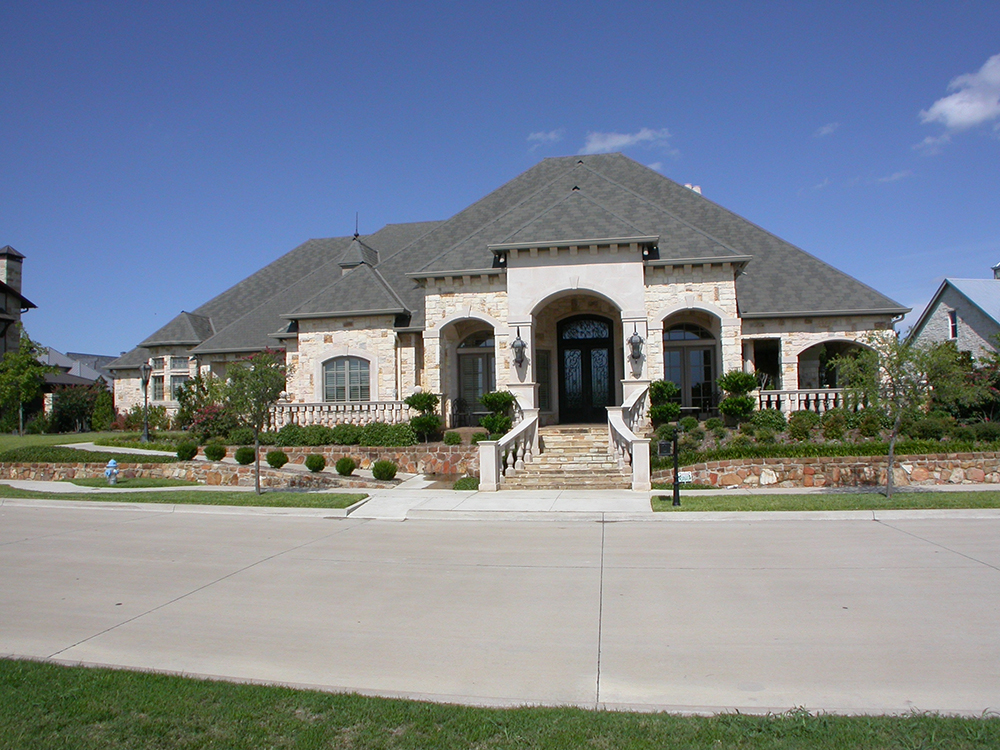 Front elevation of Mediterranean home (ThePlanCollection: House Plan #195-1121)