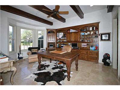 Home Office: Library of this 4-Bedroom,6610 Sq Ft Plan -6610
