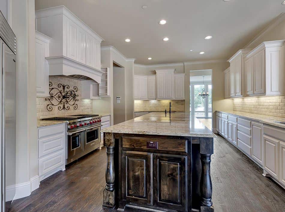 Kitchen: Kitchen Island of this 5-Bedroom,6052 Sq Ft Plan -195-1246
