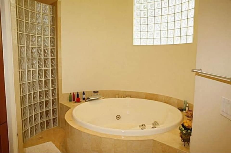 Master Bathroom: Tub of this 5-Bedroom,6381 Sq Ft Plan -195-1248