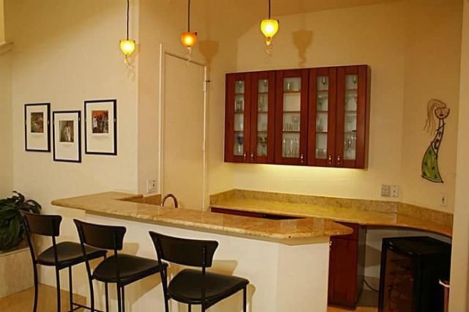 Kitchen: Breakfast Bar of this 5-Bedroom,6381 Sq Ft Plan -195-1248