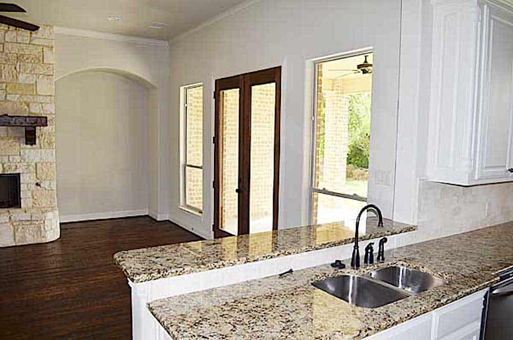 Kitchen: Breakfast Bar of this 4-Bedroom,3164 Sq Ft Plan -195-1284
