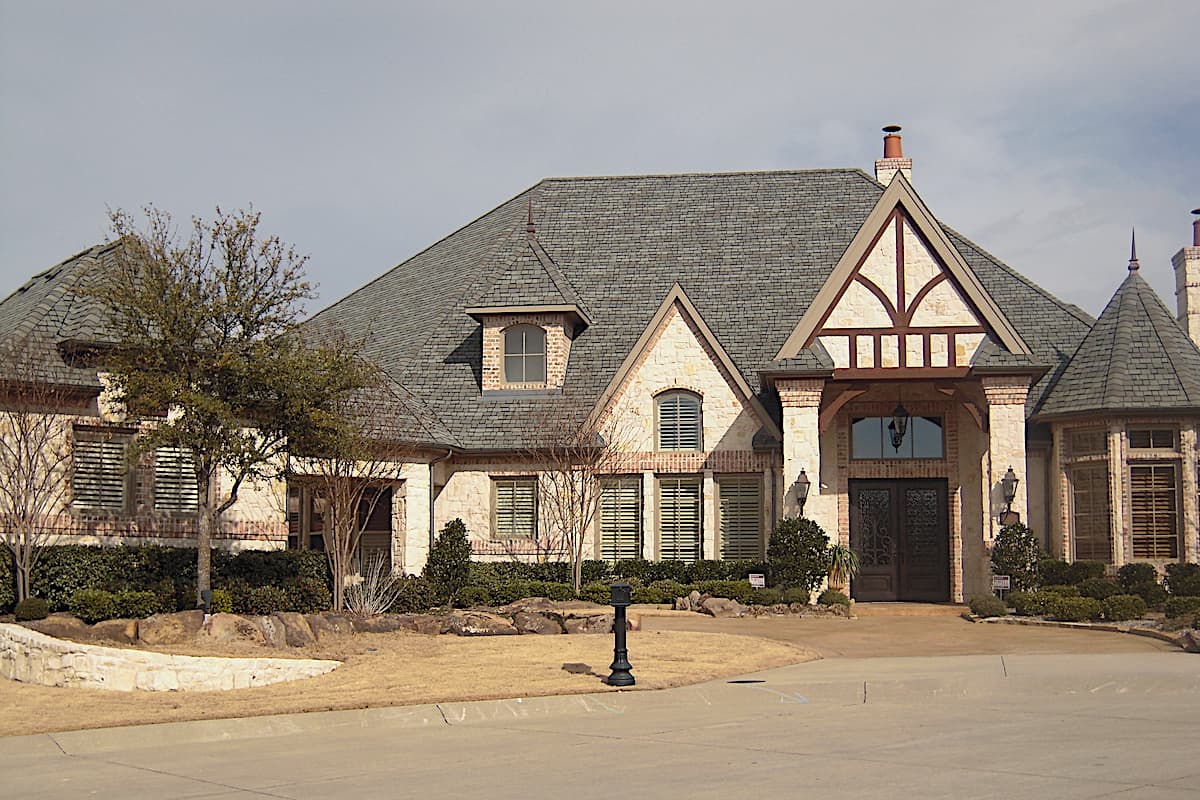 French Country manor-style house design (ThePlanCollection: Plan #195-1294)
