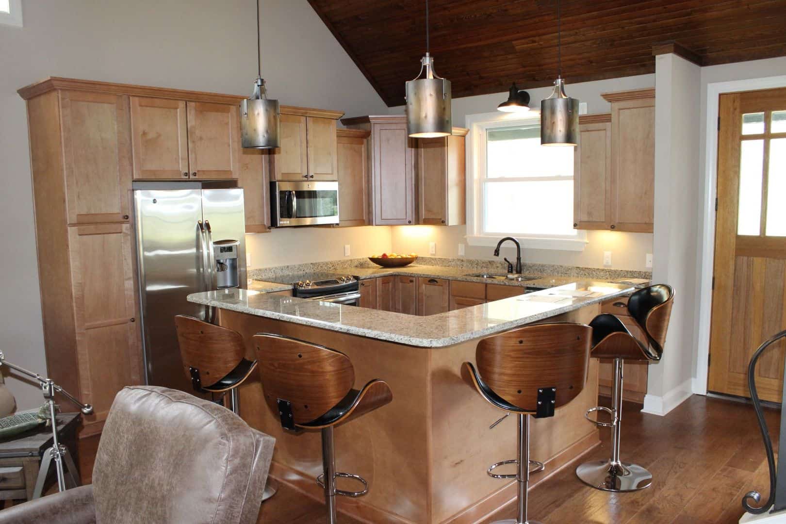 Kitchen: Breakfast Bar of this 3-Bedroom,1841 Sq Ft Plan -196-1131