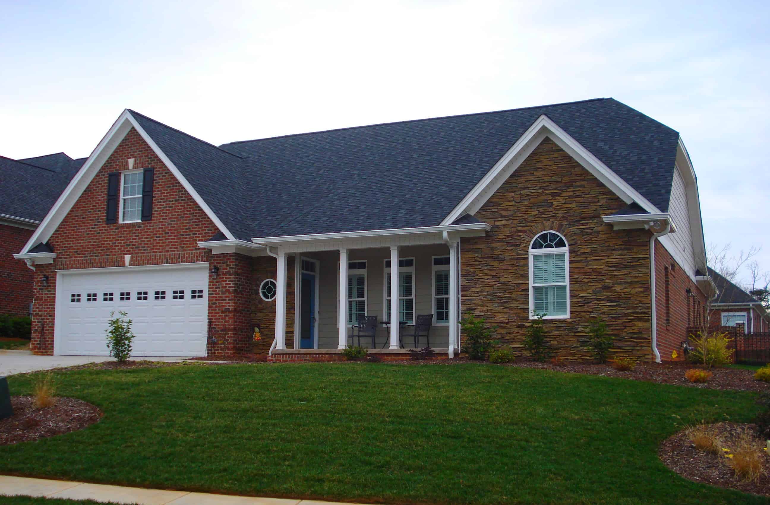 Front elevation of Farmhouse home (ThePlanCollection: House Plan #196-1146)