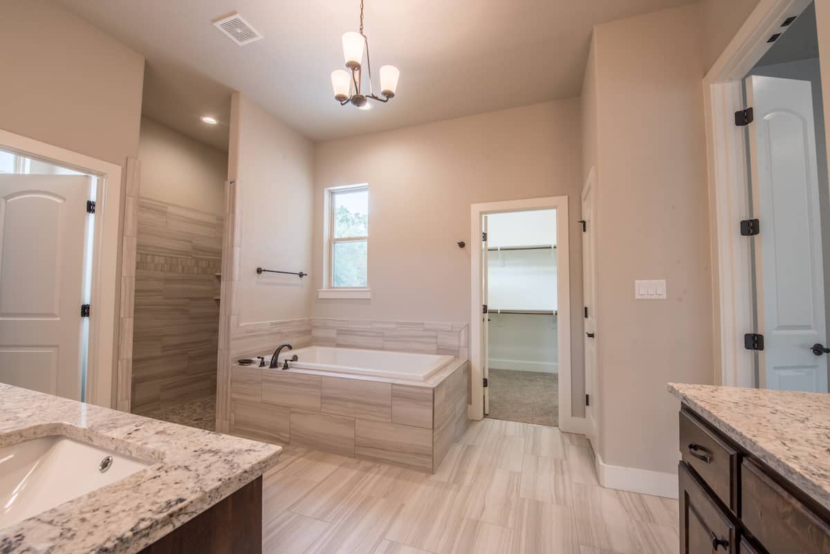 Master Bathroom: Tub of this 3-Bedroom,2709 Sq Ft Plan -196-1287