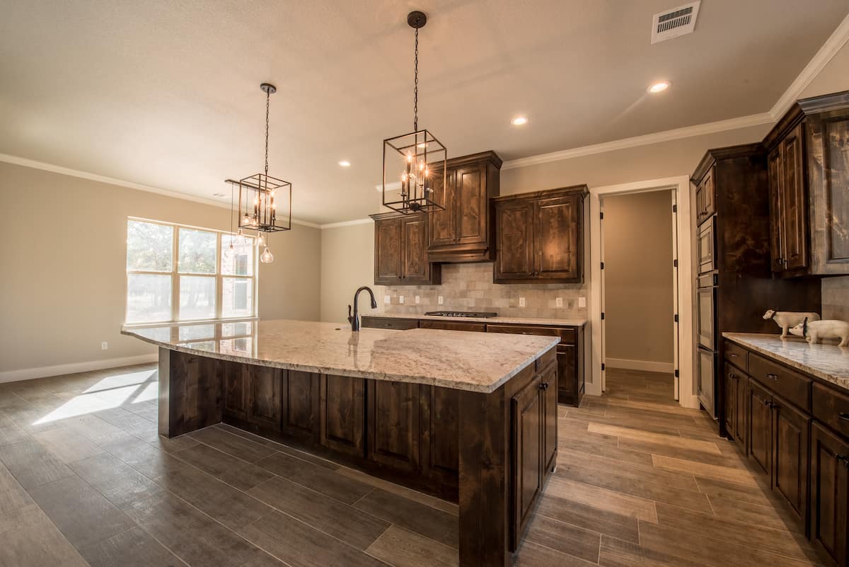 Kitchen: Kitchen Island of this 3-Bedroom,2709 Sq Ft Plan -196-1287