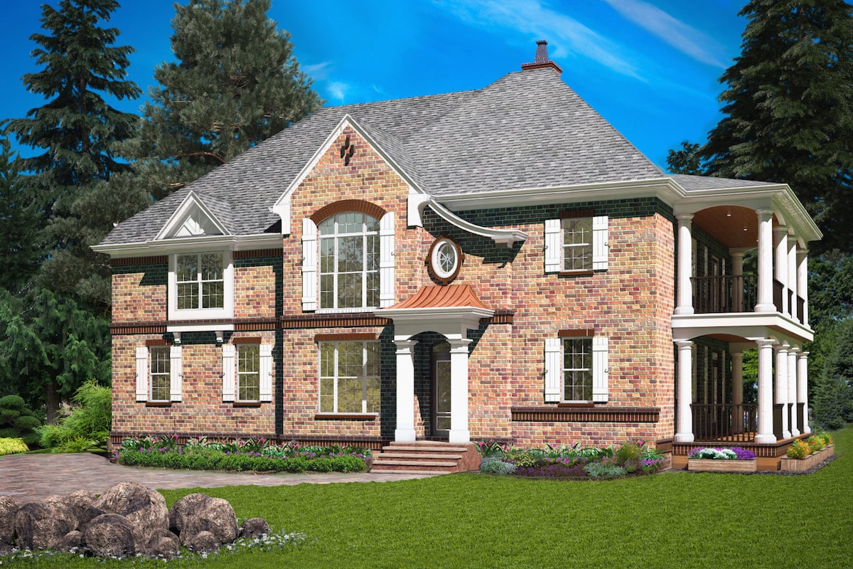 Front elevation of Tudor home (ThePlanCollection: House Plan #198-1072)