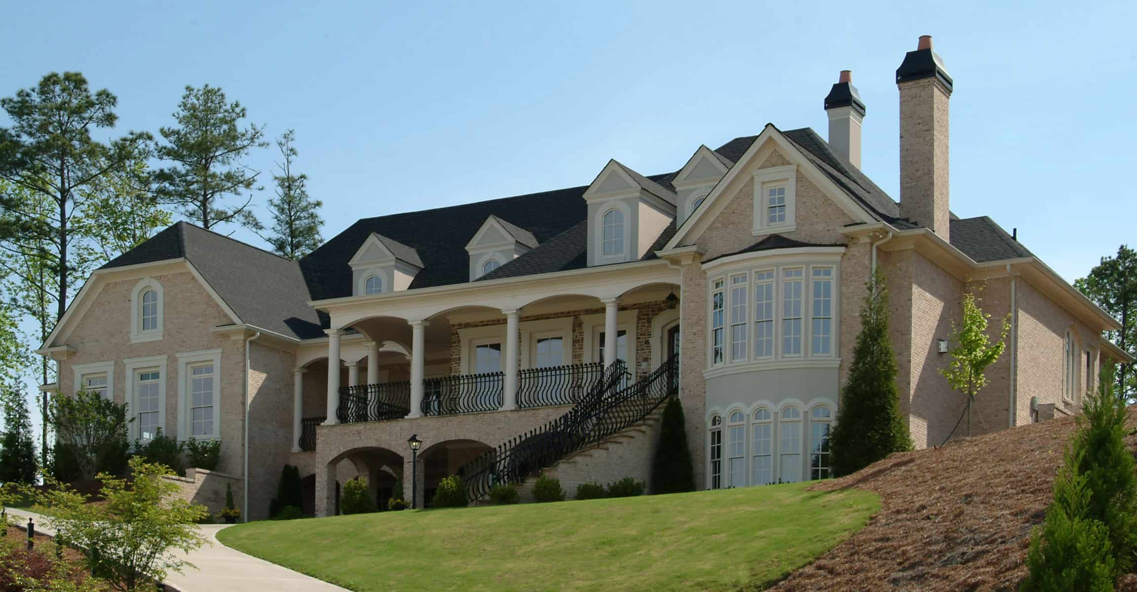 Front elevation of European home (ThePlanCollection: House Plan #198-1100)