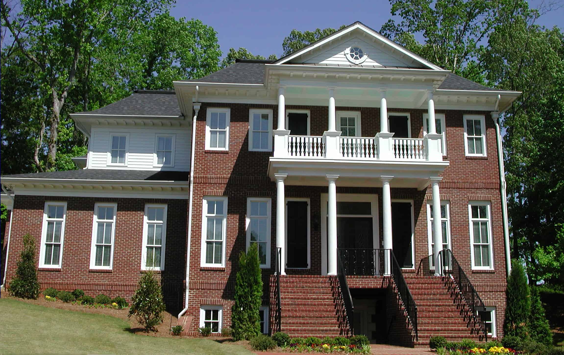 Front elevation of Georgian home (ThePlanCollection: House Plan #198-1104)