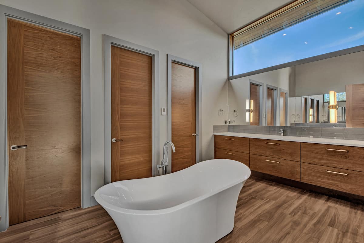 Master Bathroom: Tub of this 4-Bedroom,3838 Sq Ft Plan -202-1033