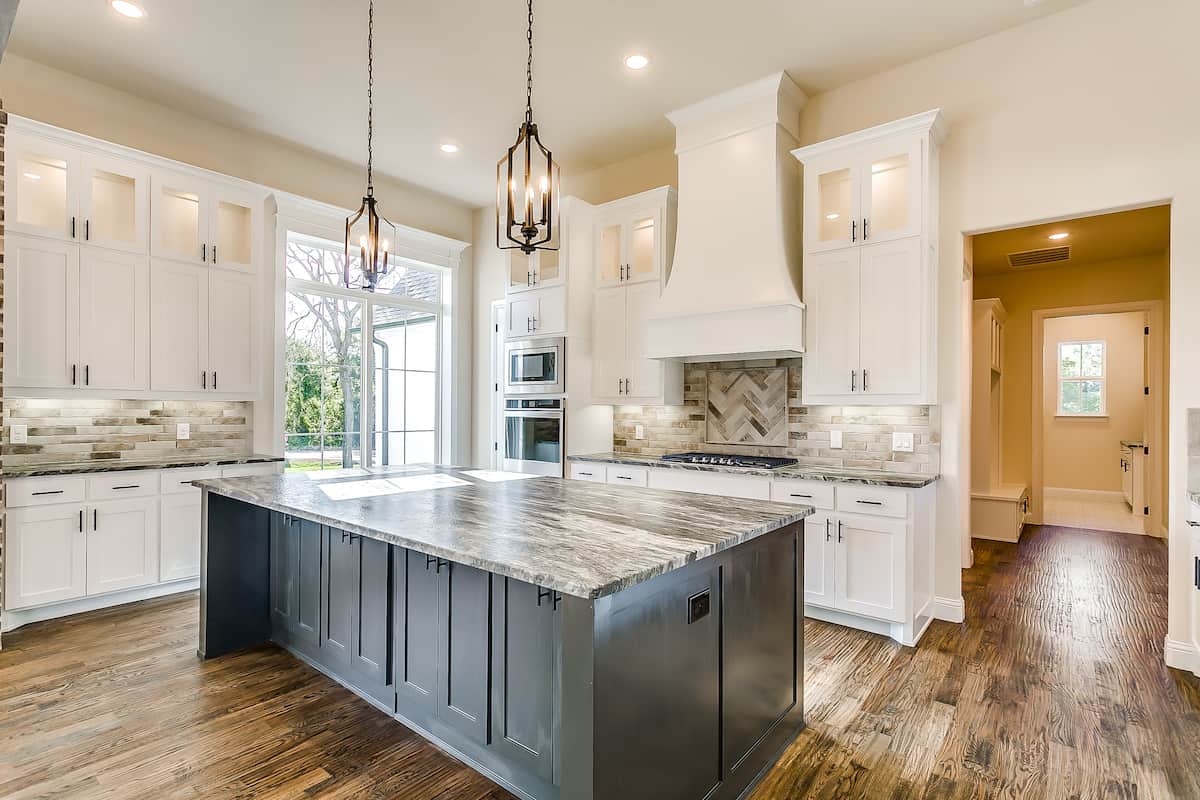 Kitchen: Kitchen Island of this 4-Bedroom,2765 Sq Ft Plan -206-1048