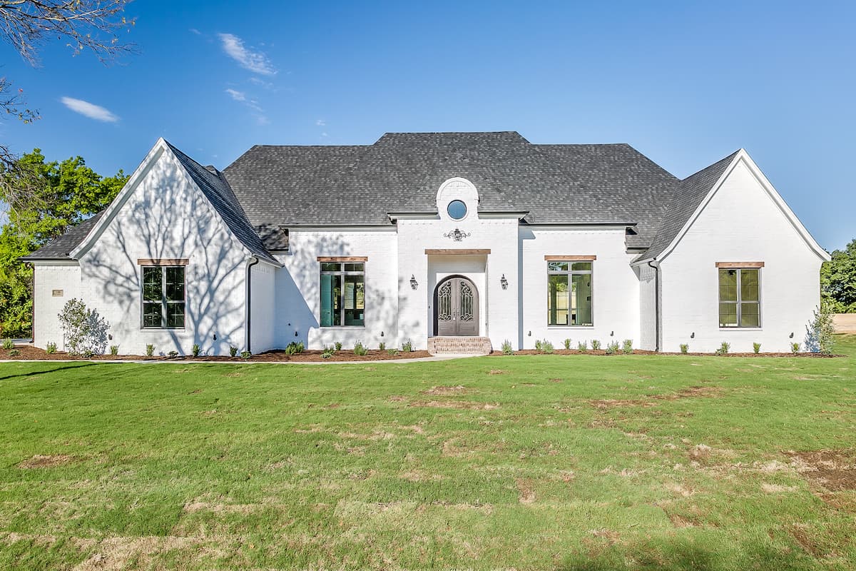 French Country style home (ThePlanCollection: Plan #206-1048)