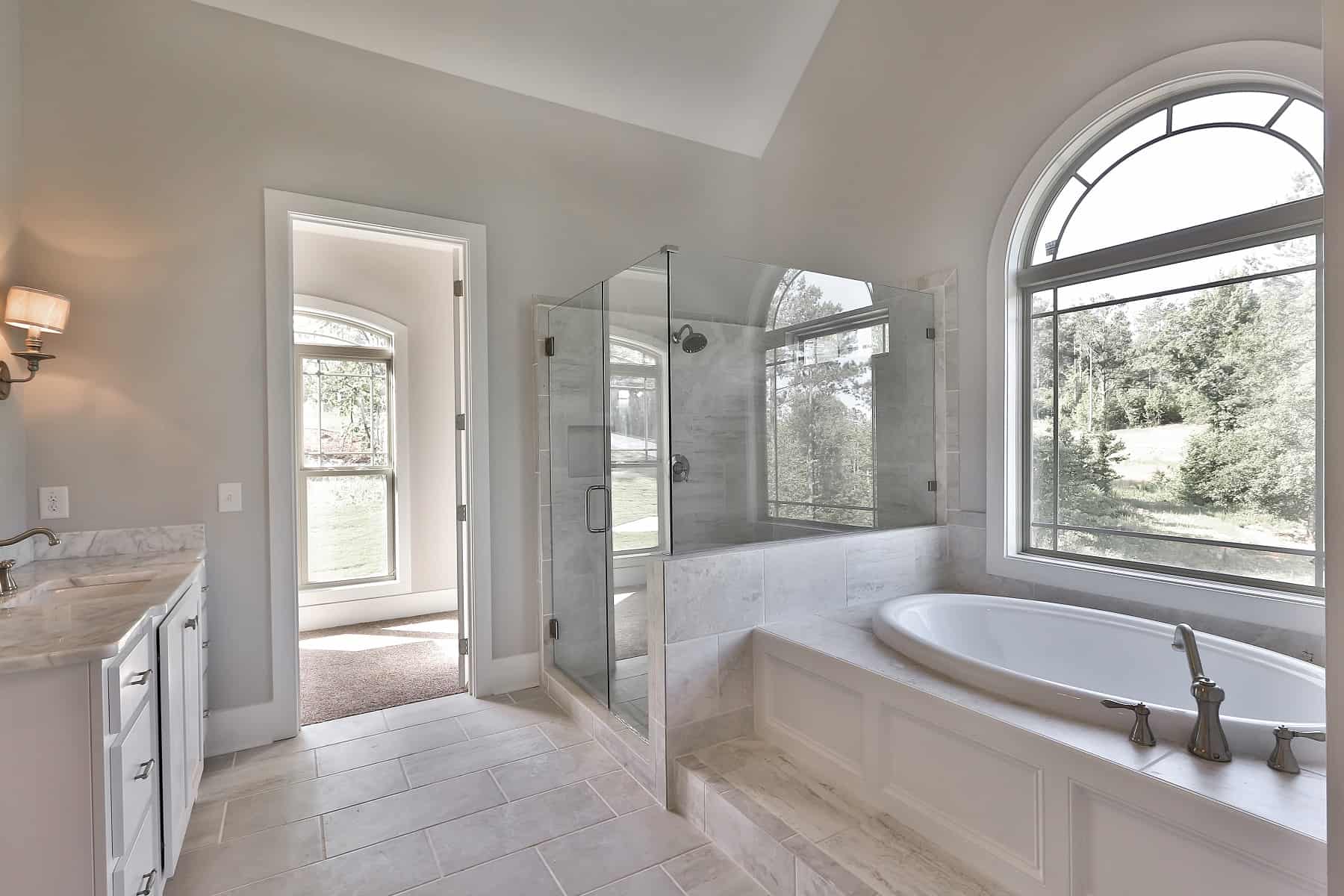 Master Bathroom: Tub of this 3-Bedroom,3061 Sq Ft Plan -213-1004