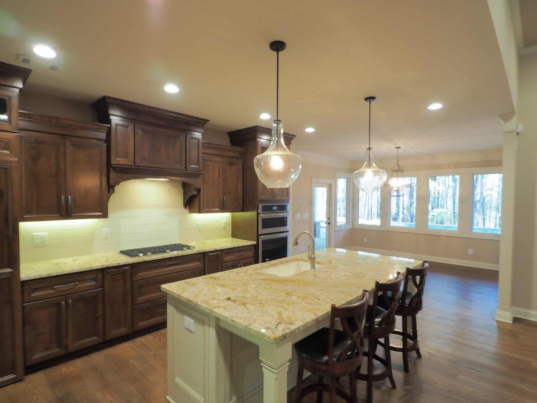 Kitchen: Kitchen Island of this 4-Bedroom,4095 Sq Ft Plan -213-1020