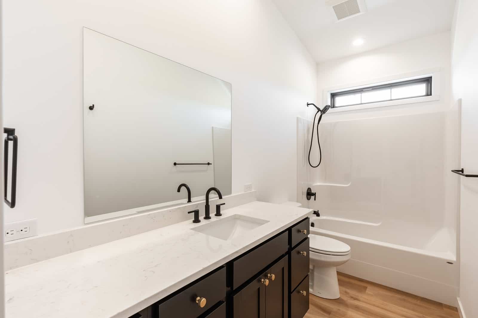 Bathroom of this 1-Bedroom,784 Sq Ft Plan -214-1005