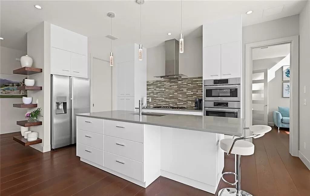Kitchen: Kitchen Island of this 3-Bedroom,2989 Sq Ft Plan -219-1011